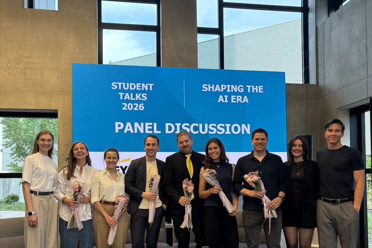 Speakers and panel guests on stage after the panel discussion at Student Talks 2026: Shaping the AI Era, WU Vienna